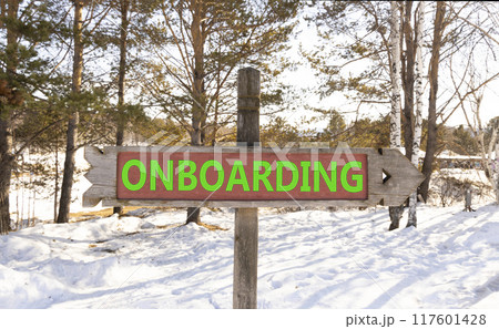 Onboarding success symbol. Concept word Onboarding on wooden road sign. Beautiful winter forest background. Business onboarding success concept. Copy space. 117601428