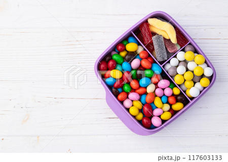 Mix of colorful candies . Multicolored unhealthy background. Sweet dessert 117603133