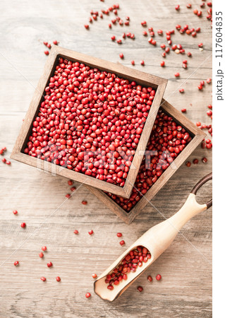 Red beans in a wooden box on a wooden board Red beans in a wooden box on a wooden board 117604835