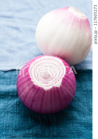 sliced red onion on wooden board sliced red onion on wooden board 117605273
