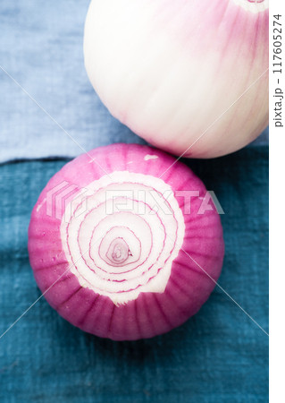 sliced red onion on wooden board sliced red onion on wooden board 117605274