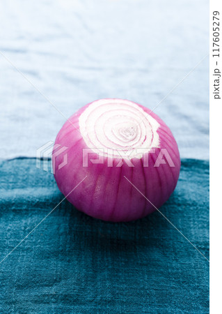 sliced red onion on wooden board sliced red onion on wooden board 117605279