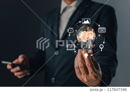 Man hold lightbulb icon ai and use smartphone, Marketers education, research, analyze media video streaming content creation and online marketing strategies to grow their digital business. 117607396