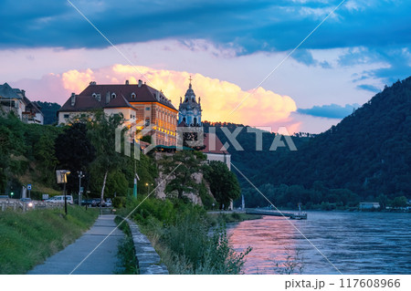 Durnstein town and Donau river in Wachau valley Austria on sunset. Traditional wine and tourism region, 117608966