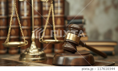 Law gavel and scales of justice on books. Law gavel and scales of justice on books. 117610344