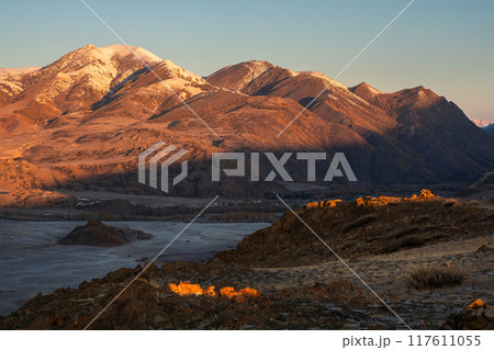 When evening shadows play with the mountains. 117611055