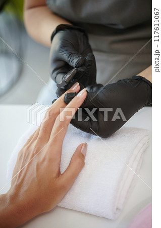 Trimming Nails with Professional Manicure Tools 117611067