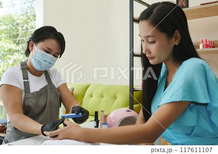 Providing Professional Manicure Services in Modern Salon Providing Professional Manicure Services in Modern Salon 117611107