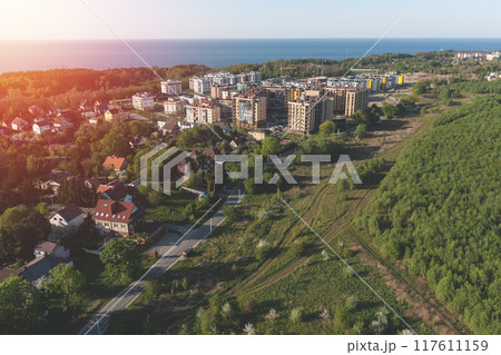 Baltic sea beach with Svetlogorsk town. Aerial view Baltic sea beach with Svetlogorsk town. Aerial view 117611159