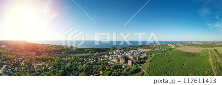 Baltic sea coastline with Svetlogorsk town. Aerial panorama view. Long banner 117611413