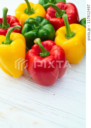 Fresh sweet bell pepper ( paprika ) photography red , green and yellow . Colorful vegetable . Top view 117612497