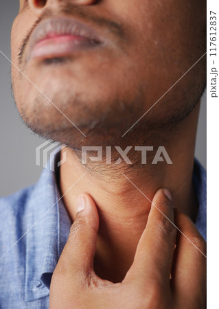 unrecognized man suffering throat pain close up  117612837