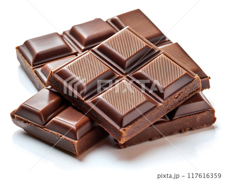 Sweet chocolate pieces isolated on white background. 117616359