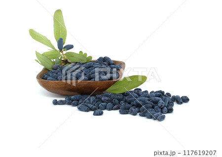 Blue Honeysuckle berries isolated on white background Blue Honeysuckle berries isolated on white background 117619207