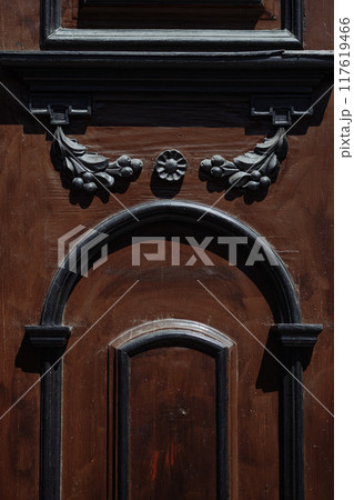 Wooden door panel with phrases and patterns 117619466