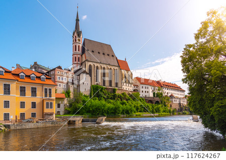St Vitus church in the middle of historical city centre. View from Vltava River. Cesky Krumlov, Southern Bohemia, Czech Republic. 117624267