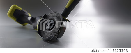 Cordless new hand sander on a gray background Cordless new hand sander on a gray background 117625598
