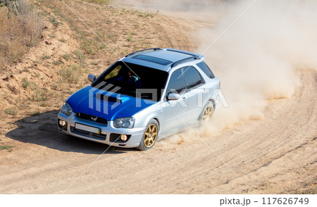 Sports Hatchback on a Dirt Track Sports Hatchback on a Dirt Track 117626749