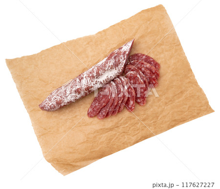 salami on parchment paper isolated on white salami on parchment paper isolated on white 117627227