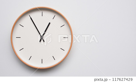 Minimalist wooden Wall Clock on White Wooden Surface with Space for Text. Time Set at 00.55/12.55 Minimalist wooden Wall Clock on White Wooden Surface with Space for Text. Time Set at 00.55/12.55 117627429