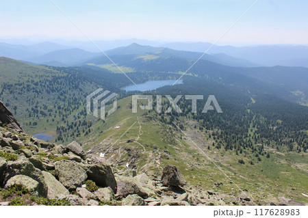 View from a high mountain on a hiking trail to lake svetloye in Ergaki nature park 117628983