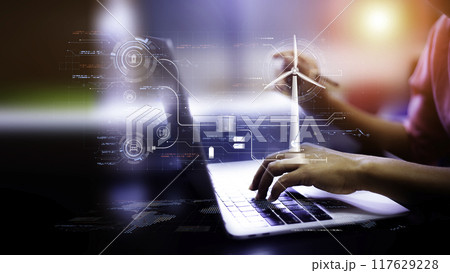 Businessman using laptop analyzing sales data on futuristic virtual screen technology and economic growth graph. business work Global strategy planning, virtual icons and stock market analysis graphs 117629228