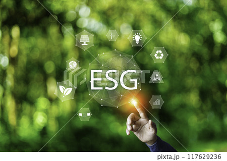 Net zero 2050 ESG concept, Hand with green world, wind energy system icon on blurred green leaf background. wind energy for green environment. Businessman background with energy icons around Net zero 2050 ESG concept, Hand with green world, wind energy system icon on blurred green leaf background. wind energy for green environment. Businessman background with energy icons around 117629236