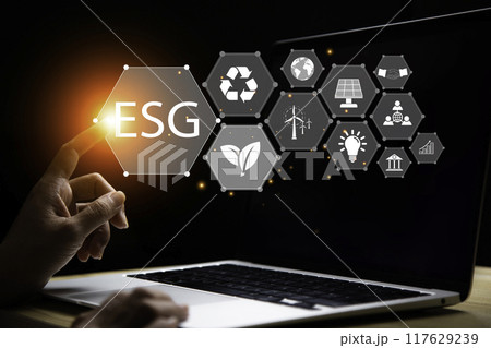 Net zero concept. Hand holding bulb with ESG icon. It is surrounded by a clean energy icon. Net zero 2050. Carbon gas affects global warming. Concept with innovation inspiration from big data. 117629239
