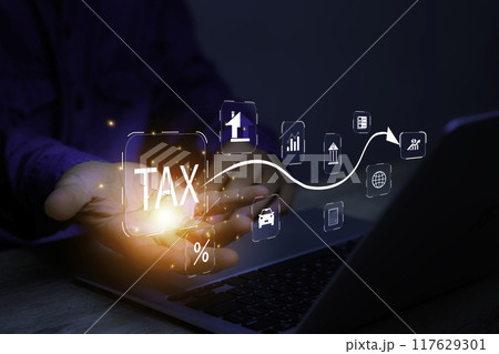 Businessman using laptop to fill in the income tax online return form for payment.business using computer filling personal income tax return to pay tax.Futuristic virtual screen interface technology. 117629301