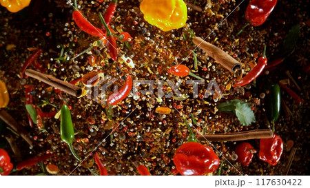 Freeze Motion Shot of Flying Mix Spices . Isolated on Black Background 117630422