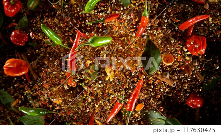 Freeze Motion Shot of Flying Mix Spices . Isolated on Black Background 117630425