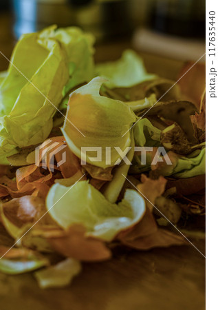 onion , potato and cabbage peels after cooking in the kitchen . High quality photo onion , potato and cabbage peels after cooking in the kitchen . High quality photo 117635440