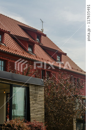 The side view house with red tiled roof . High quality photo 117635491