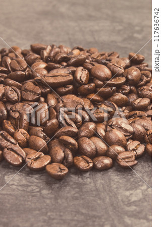 Heap of roasted coffee grains. Structure concrete 117636742