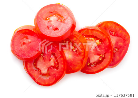 Tomato slice isolated over white background Tomato slice isolated over white background 117637591