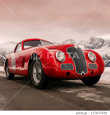 Red Vintage Sports Car on Snowy Mountain Road 117637830