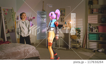 Teen girl talks to virtual reality hologram in metaverse AI chat Teen girl talks to virtual reality hologram in metaverse AI chat 117638264