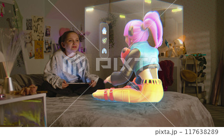 Young girl talks to virtual reality hologram of AI friend Young girl talks to virtual reality hologram of AI friend 117638289