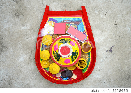 Colorful Bengali Kulo used in Marriage Function Colorful Bengali Kulo used in Marriage Function 117638476