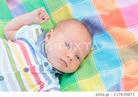 Little baby on colorful blanket Little baby on colorful blanket 117638871