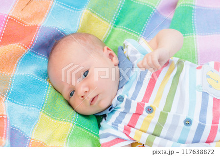 Little baby on colorful blanket Little baby on colorful blanket 117638872