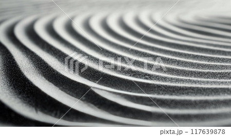 Detailed patterns of sound waves created on a textured surface during a scientific demonstration 117639878