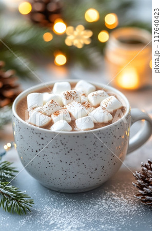 Cozy hot chocolate with marshmallows and cinnamon surrounded by festive decorations 117640423