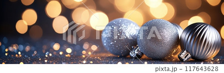 A silver and white Christmas ornament with a blue background 117643628