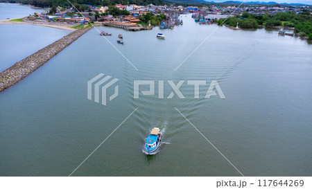 Aerial view of fishing village and gulf at Pak Nam Sichon, estuary area in Chumphon Province, Thailand. Aerial view of fishing village and gulf at Pak Nam Sichon, estuary area in Chumphon Province, Thailand. 117644269