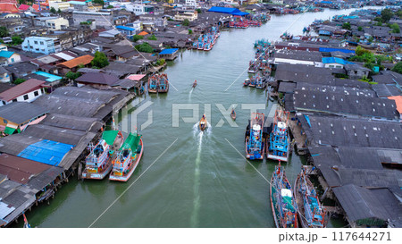 Aerial view of fishing village and gulf at Pak Nam Sichon, estuary area in Chumphon Province, Thailand. Aerial view of fishing village and gulf at Pak Nam Sichon, estuary area in Chumphon Province, Thailand. 117644271