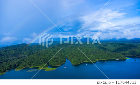 Aerial view of the River Kwai and floating houses in Kanchanaburi Province, Thailand. Beautiful view of floating cottages and and green forest along the River Kwai. 117644313