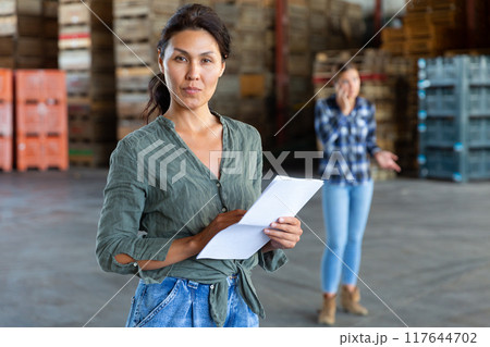 Man and woman talking about documentation Man and woman talking about documentation 117644702