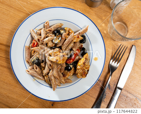 Pasta with fried chicken and vegetables Pasta with fried chicken and vegetables 117644822