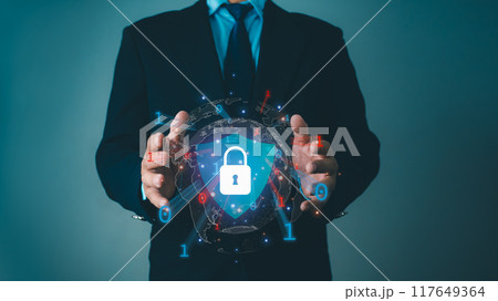 Businessman protecting data personal information on virtual interface, Network security system concept, Locked key inside a shield guard to protect personal identity, Cyber security network. 117649364
